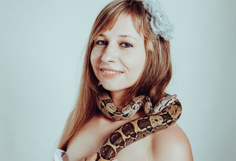 Shocking: 10 Celebs who posed with Huge snakes!
